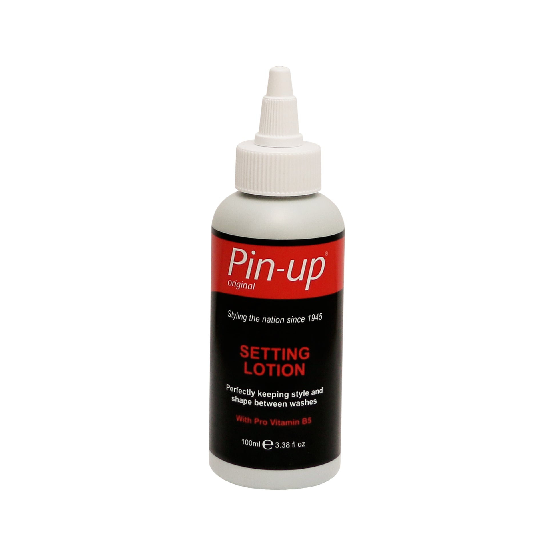 A bottle of Pin-up Perm Setting Lotion with a pointed nozzle cap and a red, black, and white label describes it as a hair styling lotion for keeping hair perfectly styled between washes.
